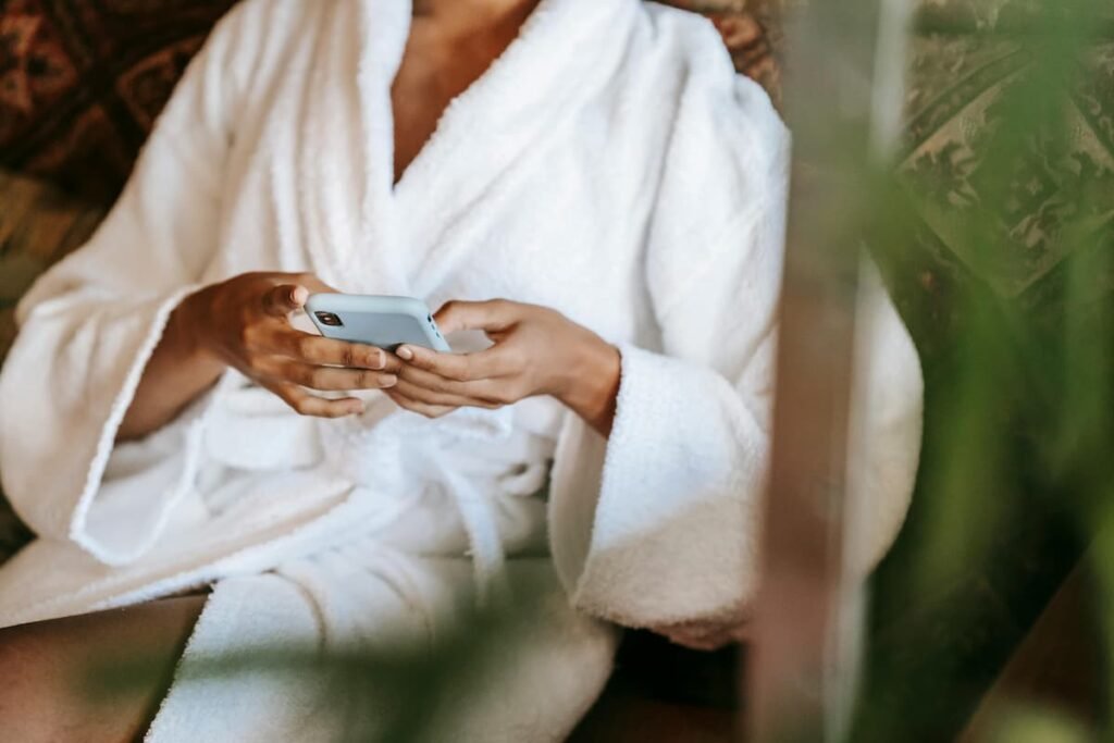 Woman on smartphone searching for med spa and aesthetic clinic services using AI search