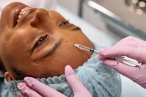Nurse practitioner injecting Botox near the brow, the kind of treatment moment an AI-ready Botox page should walk patients through step by step